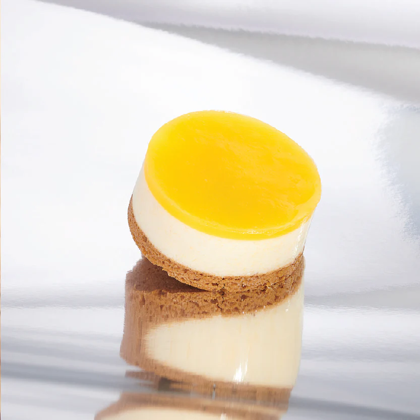 Rose & Vanilla cheesecake met mango & yuzu
